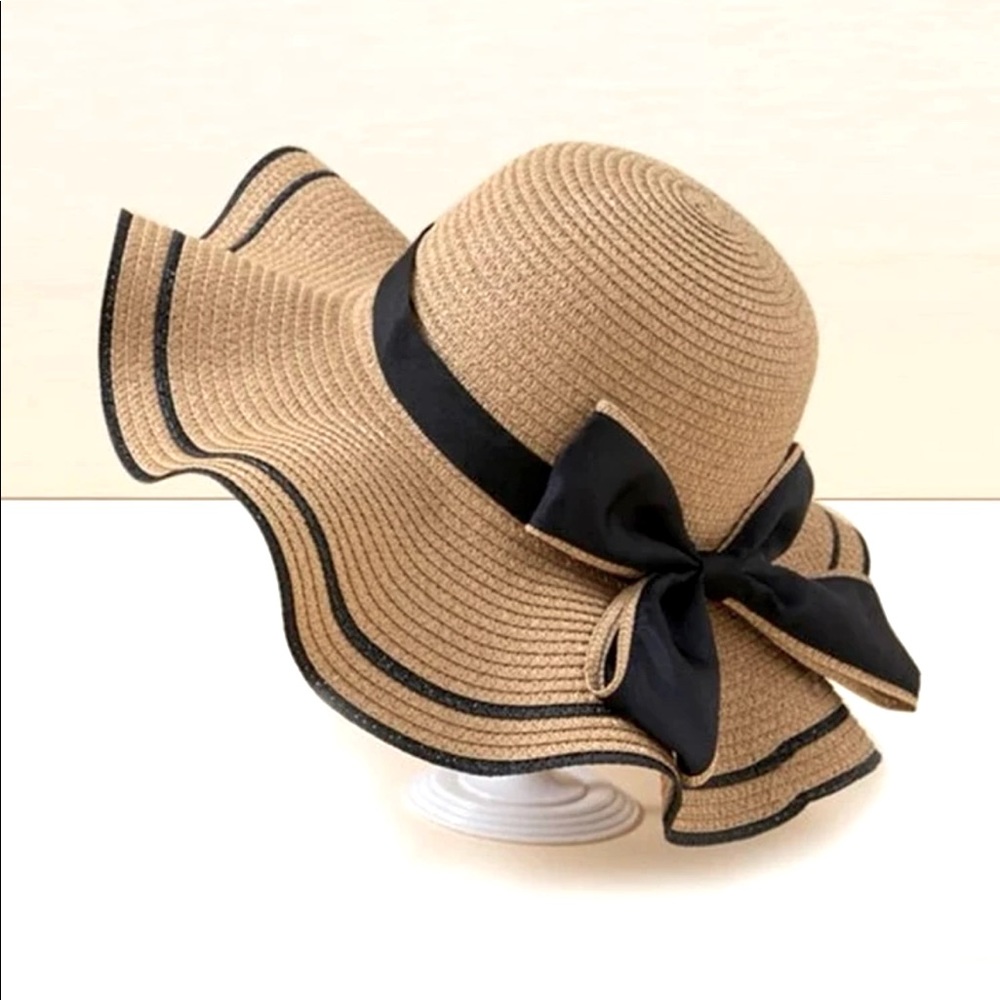 Nice summer/spring/fall hat.never worn before Perfect with a dress or swimwear